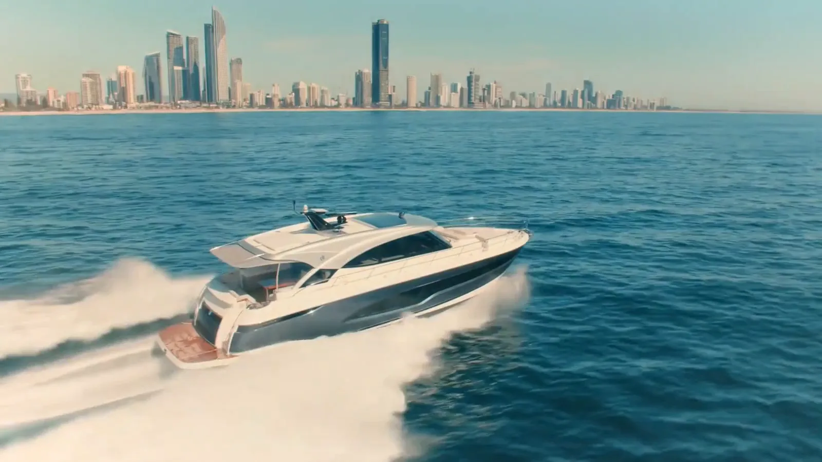 Riviera motor yacht running on open water